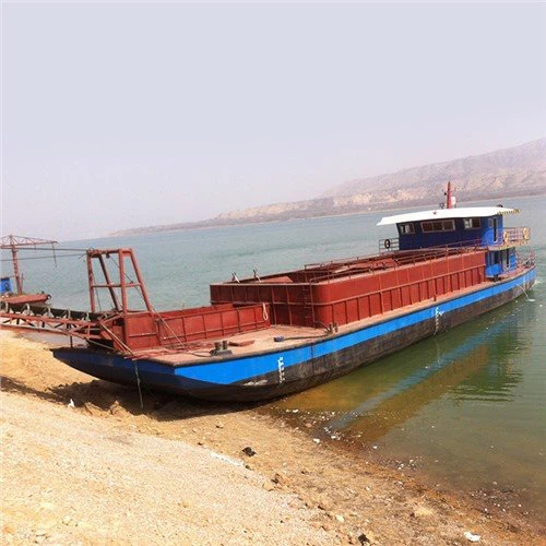 Selvgående selvlossende sand- og steinbærer for grunt vannoverføringslekter